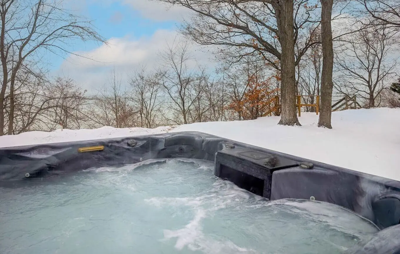 a cottage rental with hot tub in winter