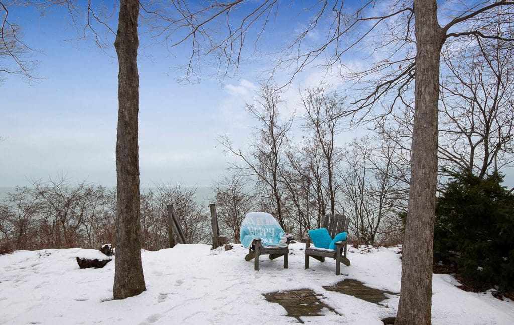 Even covered in the snow, the pretty yard is the perfect place to relax and enjoy the views.