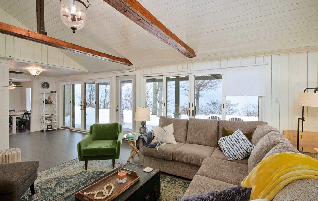 Floor-to-ceiling windows bring in tons of natural light and frame out those incredible lake views.